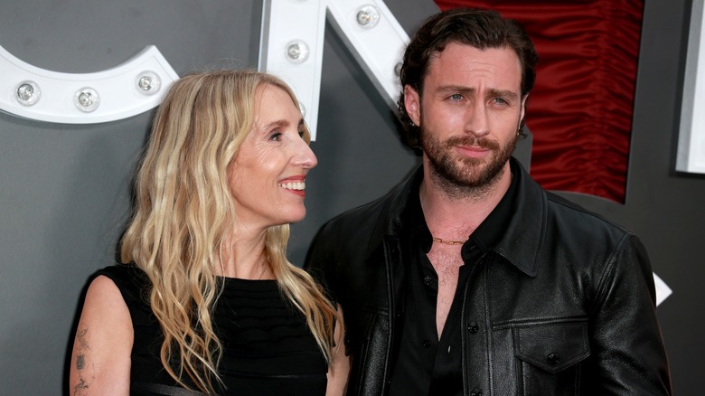 Sam and Aaron Taylor-Johnson wearing black