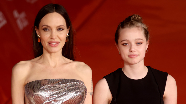 Shiloh Jolie-Pitt with Angelina Jolie