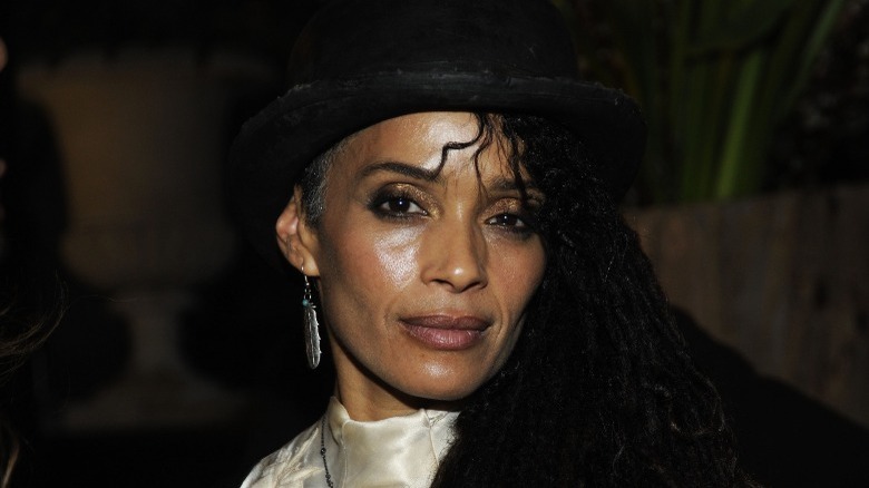 Lisa Bonet in a top hat and white shirt