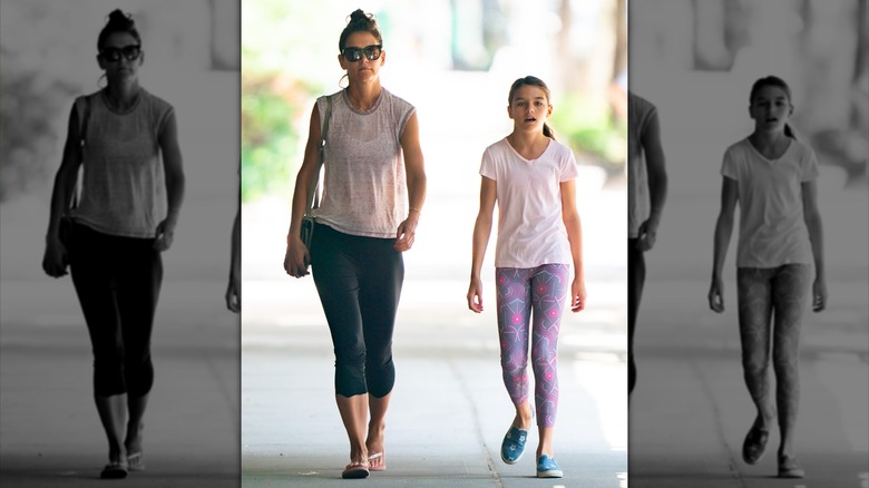 Katie Holmes Suri Cruise walking