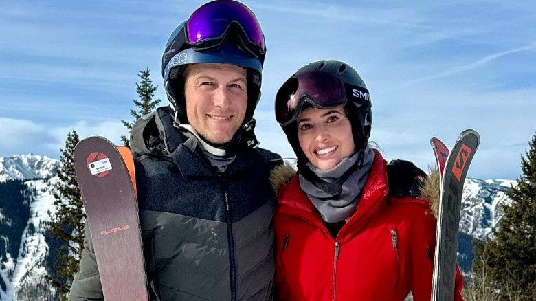 Jared Kushner and Ivanka Trump pose with skis on a mountain