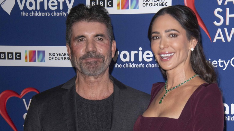 Lauren Silverman smiling with Simon Cowell