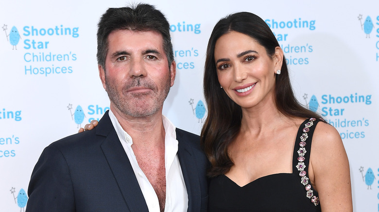 Simon Cowell and Lauren Silverman on the red carpet