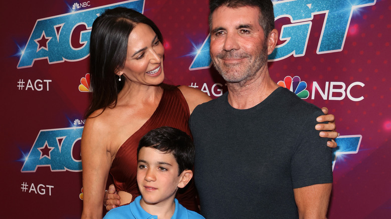 Simon Cowell with family on red carpet