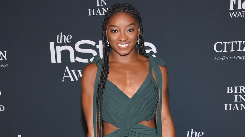 Simone Biles on a red carpet