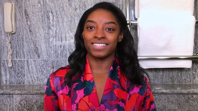 Simone Biles doing a makeup tutorial