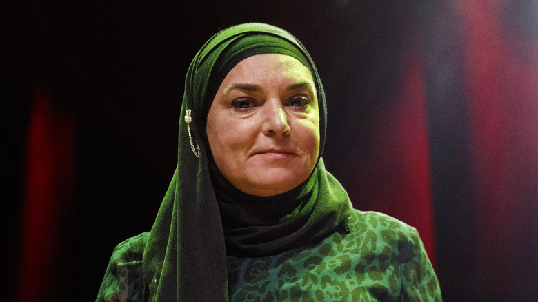 Sinead O'Connor wearing green hijab