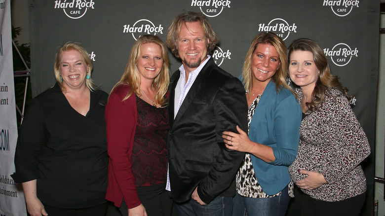 Kody Brown poses with his wives 