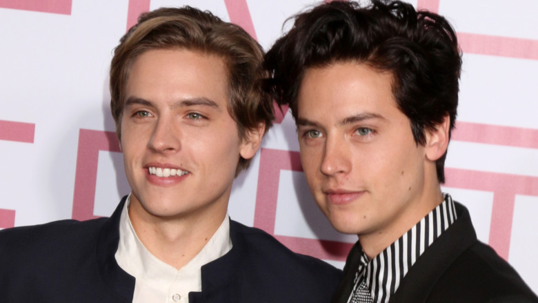 Dylan and Cole Sprouse smiling