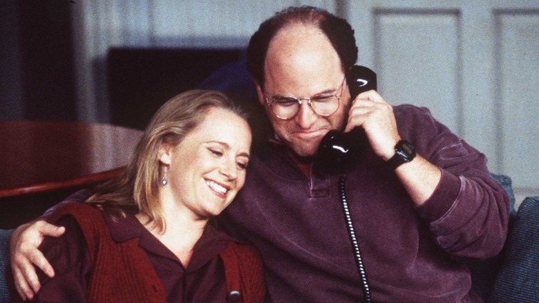 Jason Alexander embracing Heidi Swedberg 