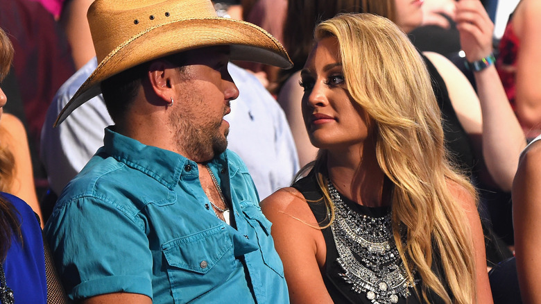 Jason Aldean talking to Brittany Kerr