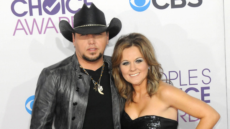 Jason Aldean posing with his first wife, Jessica Ussery