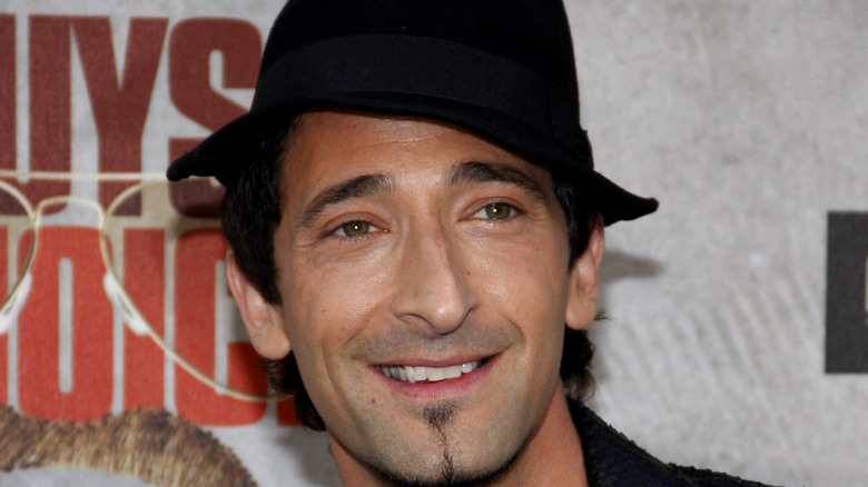 Adrien Brody hat and soul patch