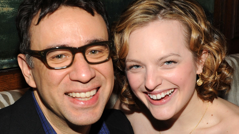 FRed Armisen and Elisabeth Moss nuzzling