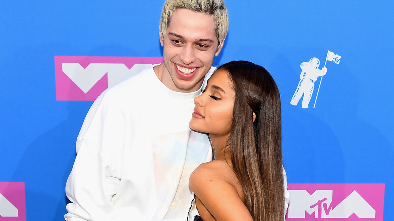 Pete Davidson and Ariana Grande chatting