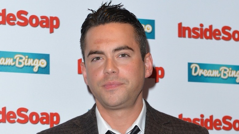 Bruno Langley smiling at event