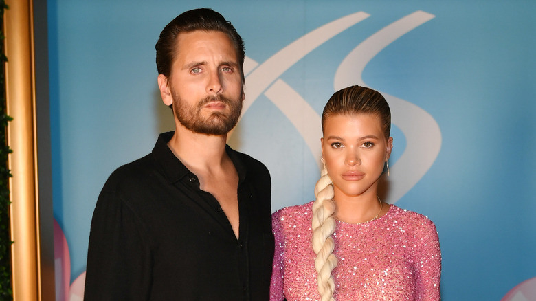 Scott Disick, Sofia Richie posing