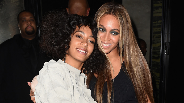 Solange and Beyoncé smiling