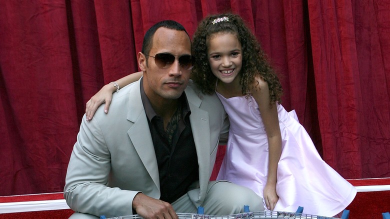 Madison Pettis with arm around Dwayne Johnson