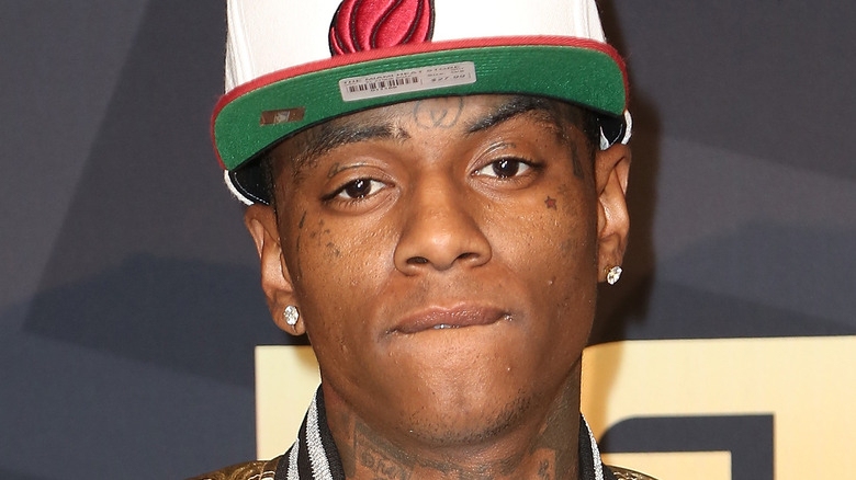 Soulja Boy wearing a Miami Heat hat