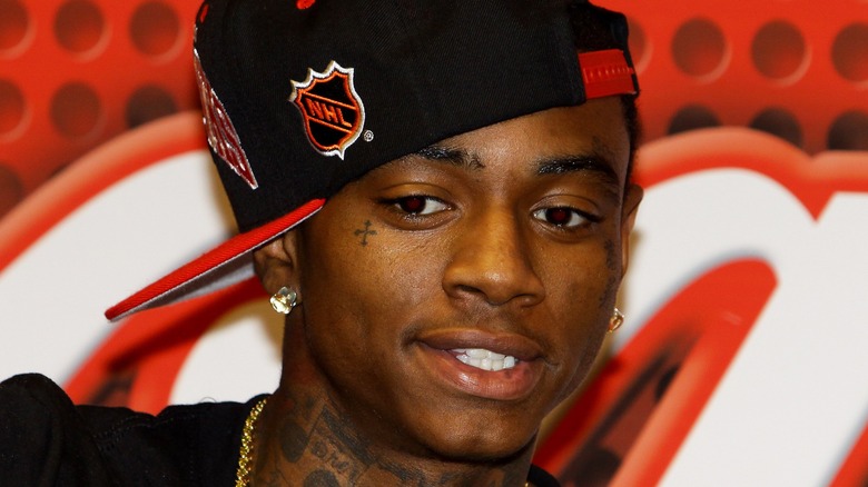 Soulja Boy wearing an NHL hat