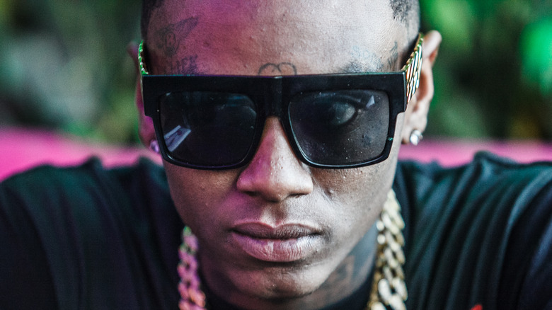 Soulja Boy wearing sun glasses 