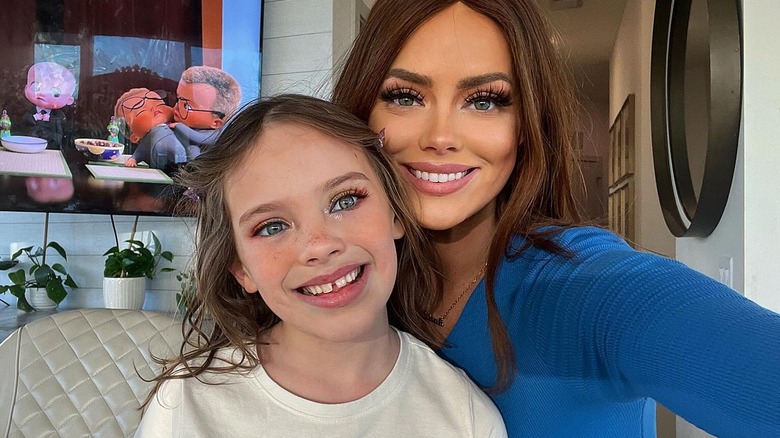 Kathryn Dennis smiles with her daughter