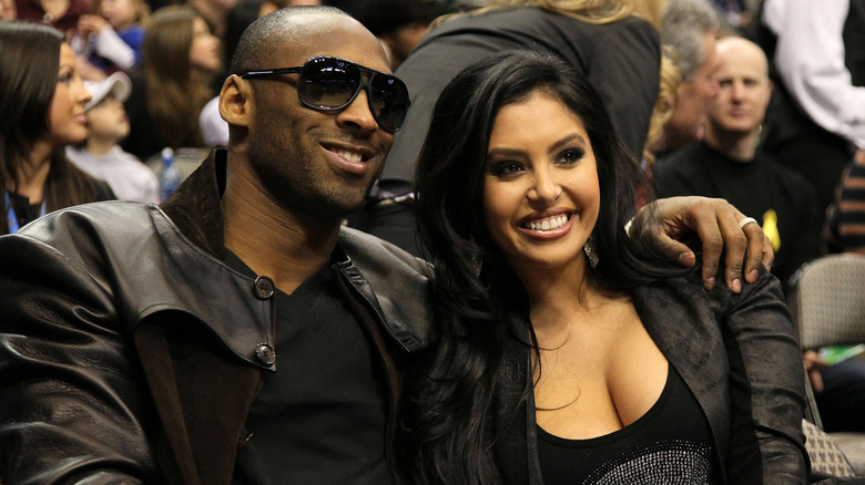 Kobe Bryant with arm around wife Vanessa