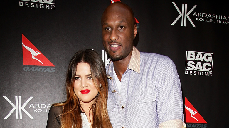 Khloe Kardashian and Lamar Odom posing