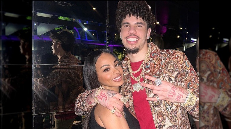 Ana Montana hugging LaMelo Ball