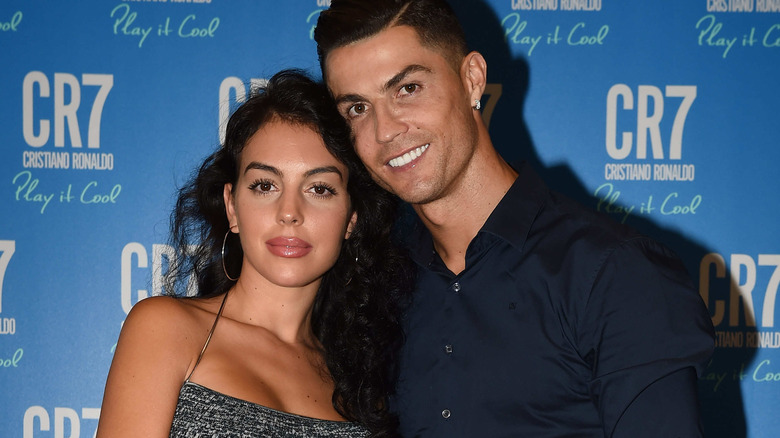 Georgina Rodriguez posing with Cristiano Ronaldo