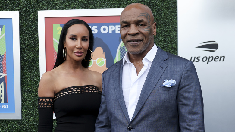 Kiki Tyson and Mike Tyson pose at the US Open