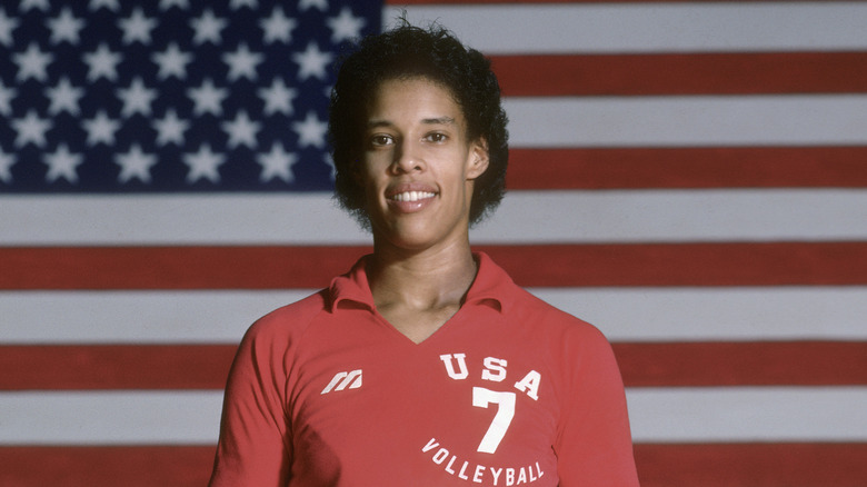 Flo Hyman in front of an American flag