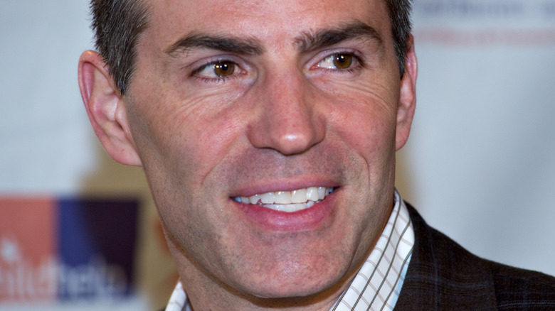 Kurt Warner half smiling