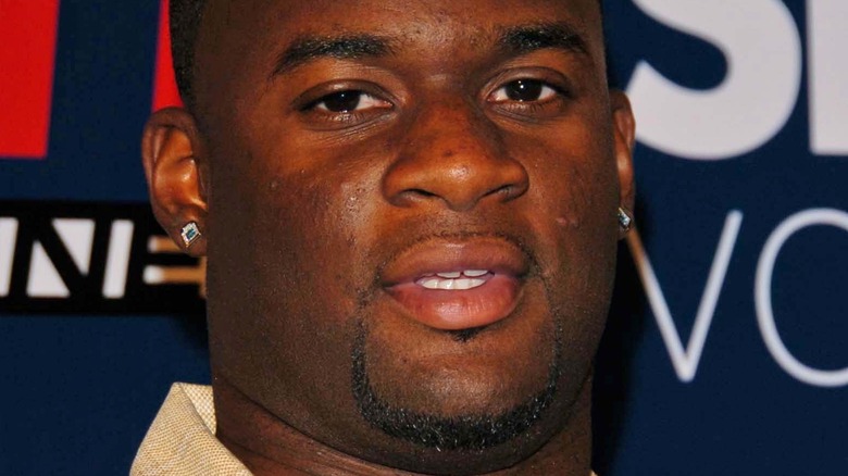 Vince Young in a tan shirt