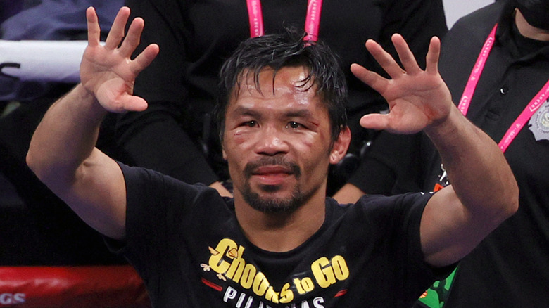 Manny Pacquiao holding up his hands