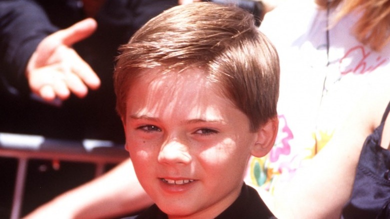 Jake Lloyd grinning