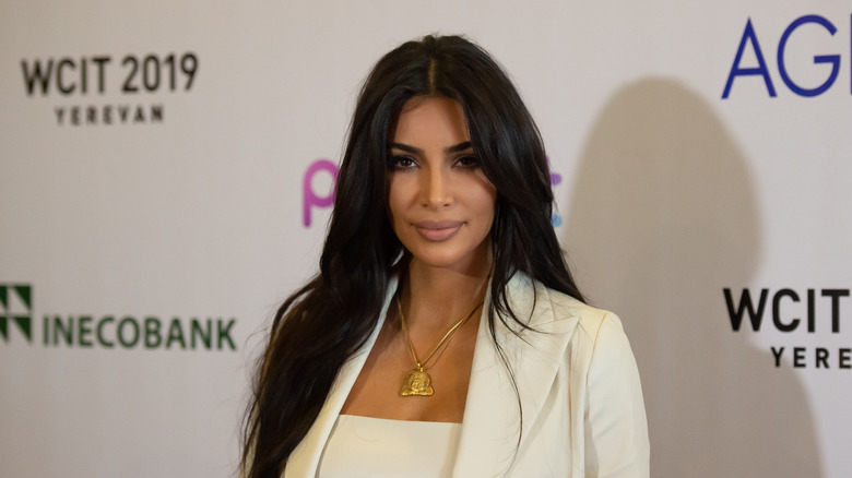 Kim Kardashian in white blazer