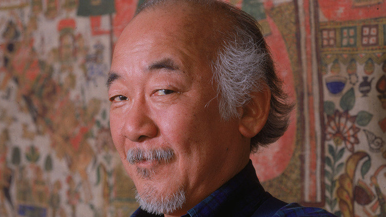 Pat Morita posing on set