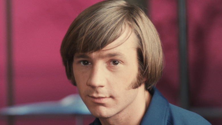 Peter Tork poses for a photo in the studio