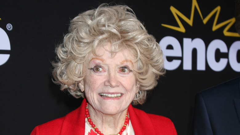 Phyllis Diller smiling on the red carpet