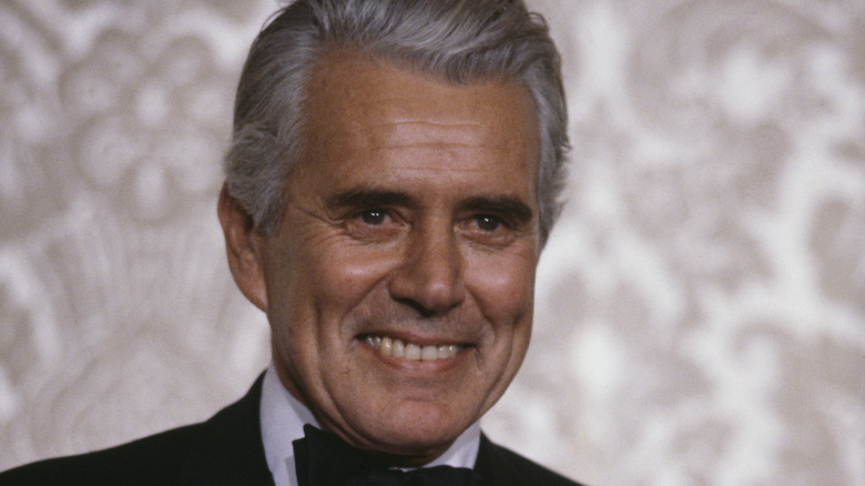 John Forsythe smiles