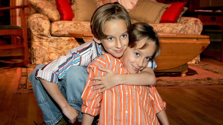 The Sweeten twins embrace on the ELR set