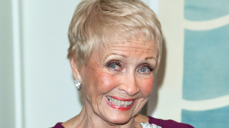 Jane Powell smiling on the red carpet