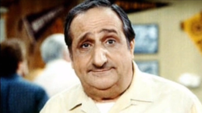 Al Molinaro standing