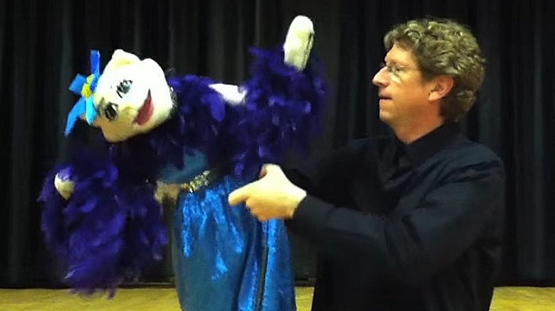 Michael Earl with cat puppet