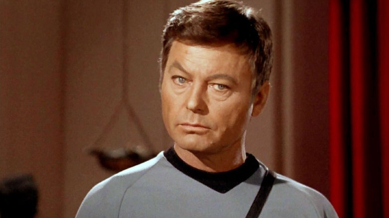 DeForest Kelley as Dr. Leonard McCoy in Star Trek