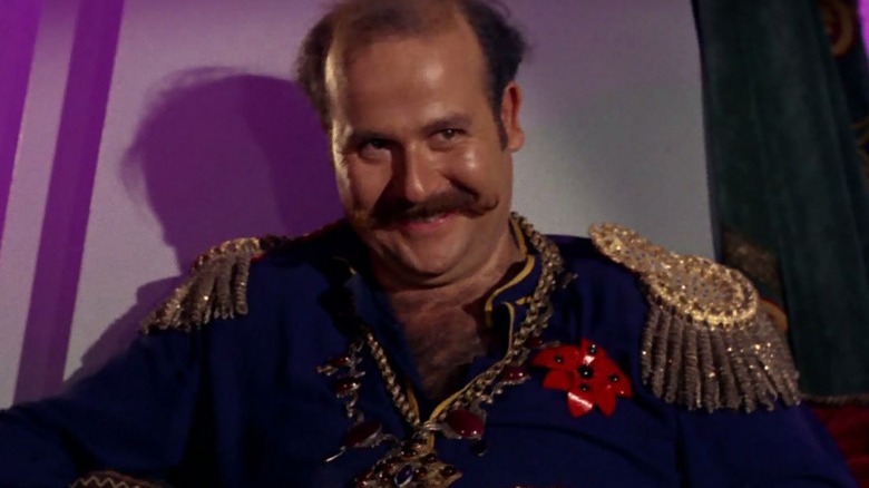 Roger C. Carmel as Harcourt Harry in Star Trek