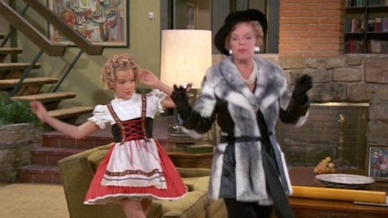 Natalie Schafer dancing with Susan Olsen (Cindy Brady) dressed as Shirley Temple