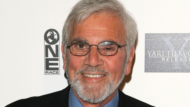 Alex Rocco smiling